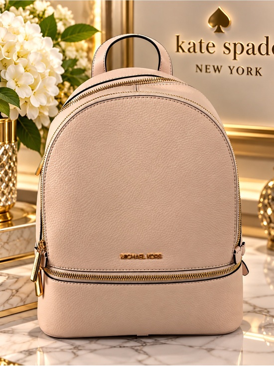 Handbags - Michael Kors Pink Pebbled Leather Mini Backpack